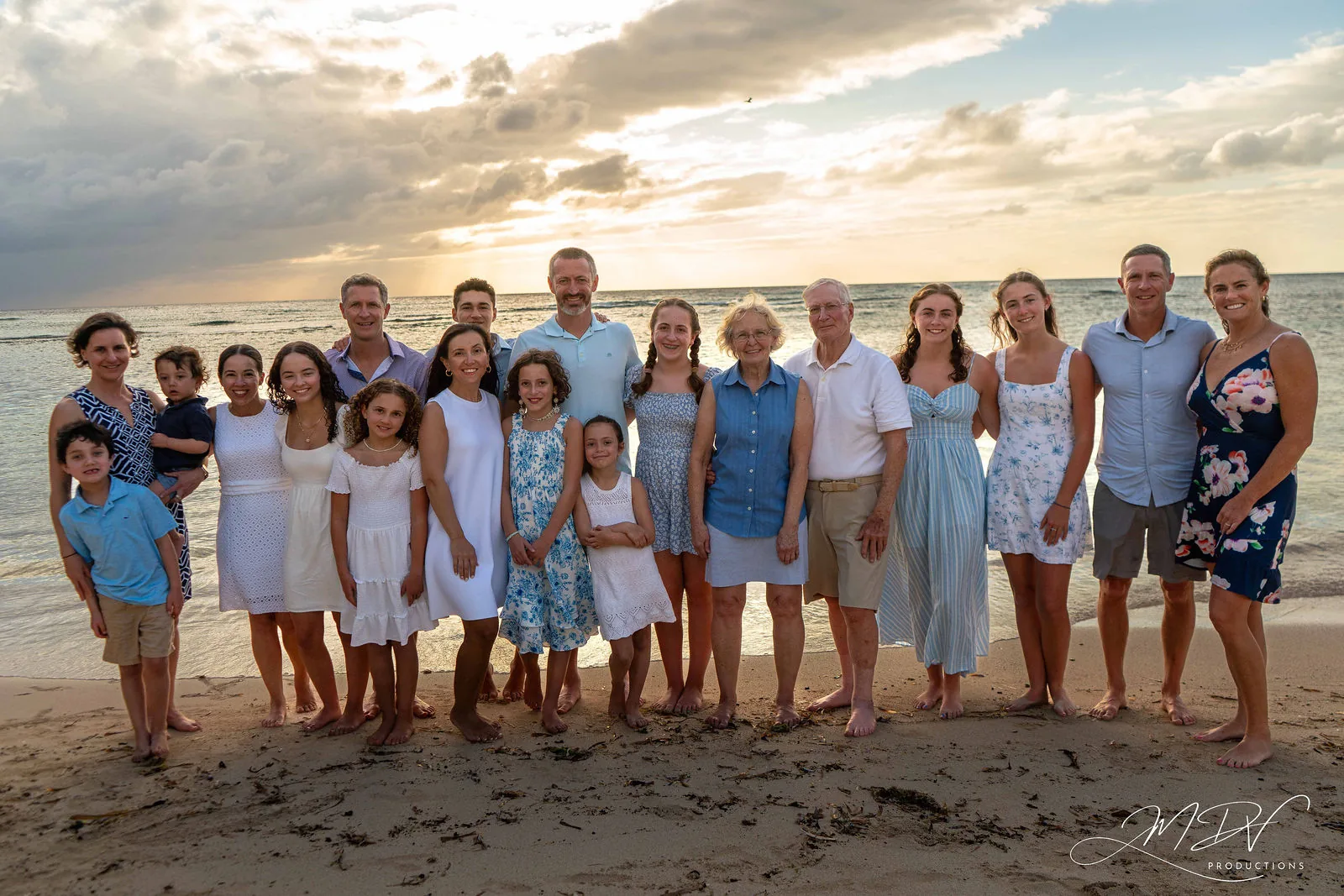 Large family group on the beach at sunset in Aruba